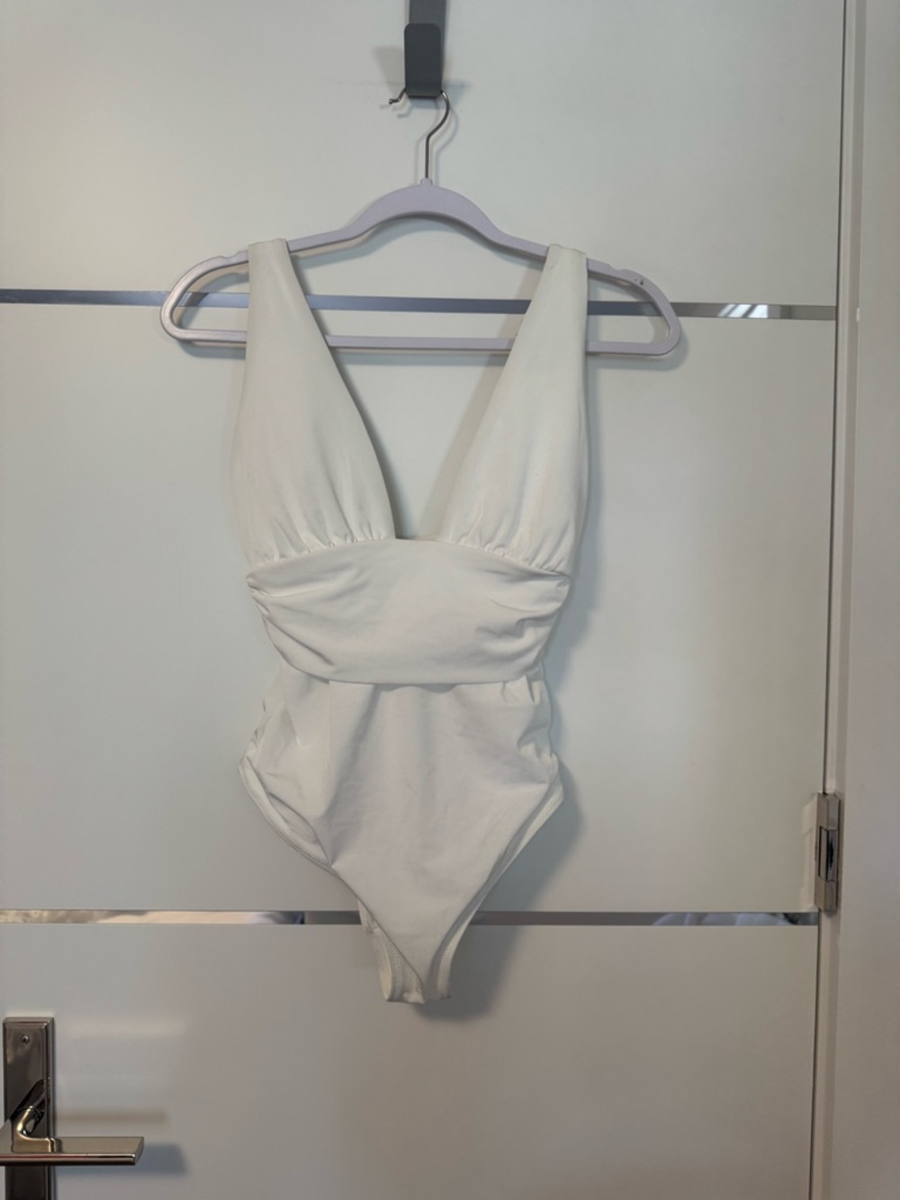 Sleek White V-Neck One-Piece Swimsuit